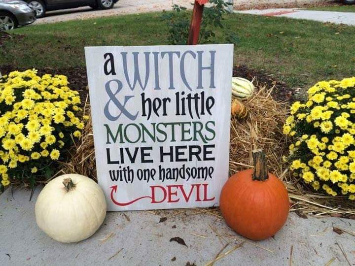 A witch & her little monsters live here with one handsome devil 14x17