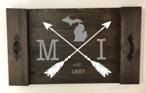 Michigan with arrows crossed