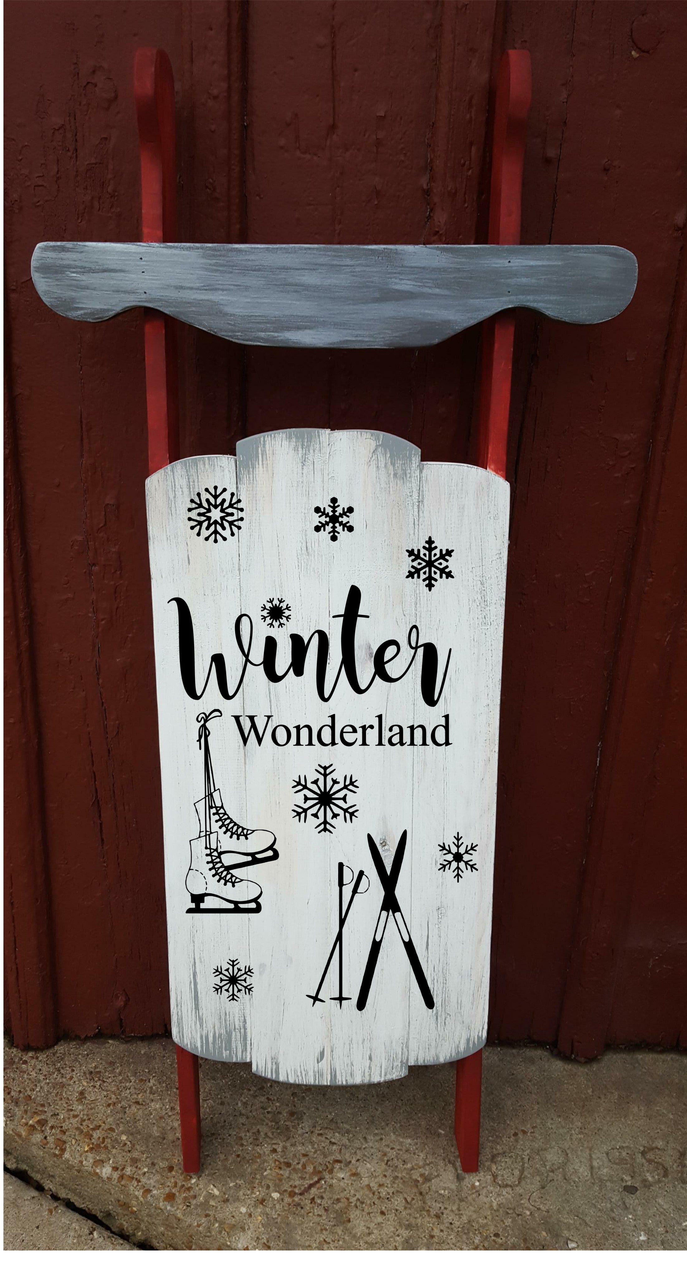 Sled - Winter wonderland with skis and skates