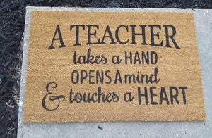 A teacher takes a hand
